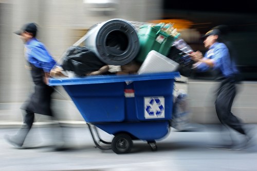 Workers assessing items for removal during a clearance job